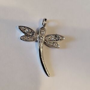 Beautiful 925 dragonfly, with white topaz on a sterling silver chain!